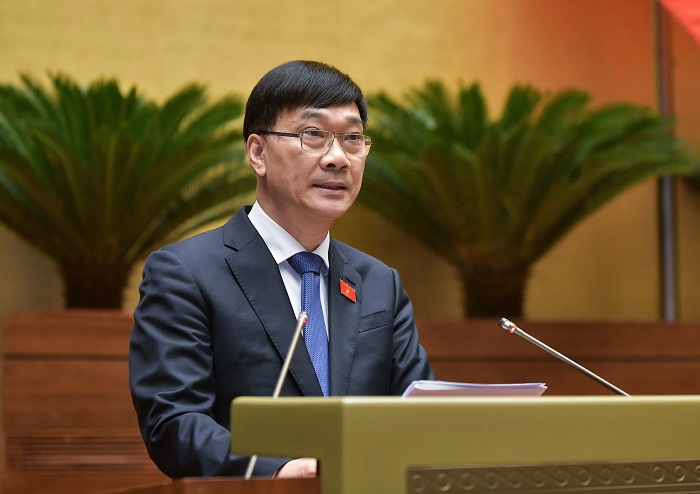 Ông Vũ Hồng Thanh, Chủ nhiệm Ủy ban Kinh tế trình bày báo cáo giải trình, tiếp thu trước khi Quốc hội bấm nút thông qua Luật Kinh doanh bất động sản (sửa đổi), ngày 28/11